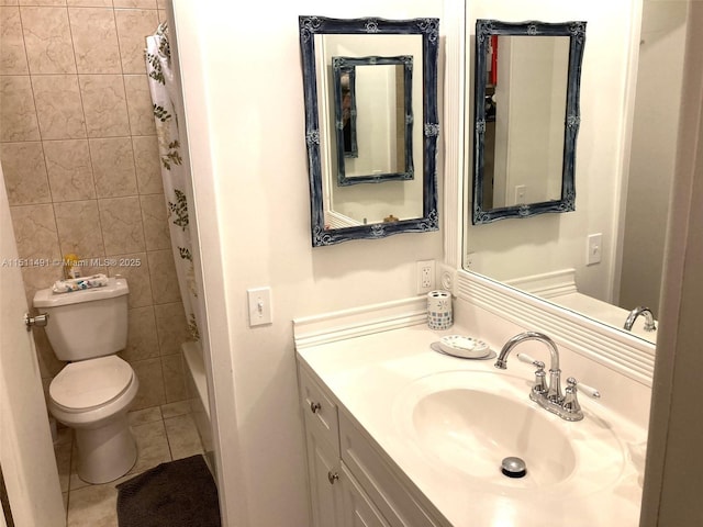 full bathroom featuring tile patterned flooring, vanity, tile walls, toilet, and shower / tub combo with curtain