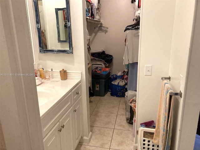 bathroom featuring vanity and tile patterned flooring