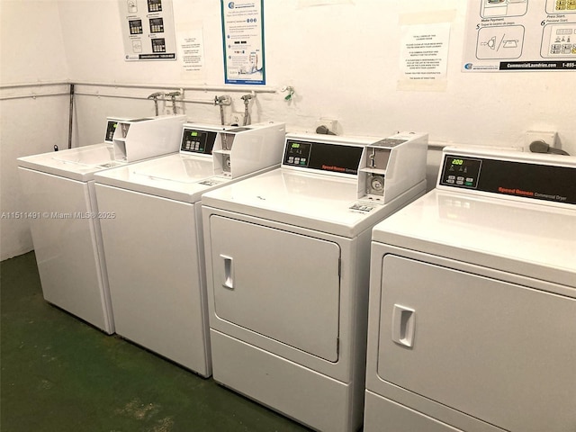 clothes washing area featuring washing machine and dryer