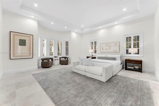 bedroom featuring a tray ceiling, recessed lighting, baseboards, and multiple windows