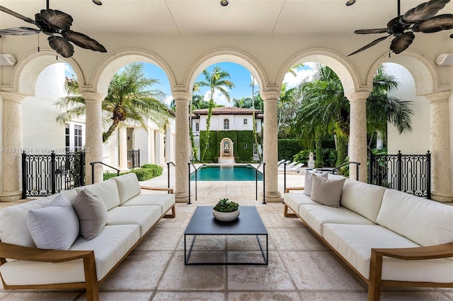 view of patio / terrace featuring ceiling fan and an outdoor hangout area