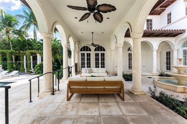 view of patio with ceiling fan, an outdoor hangout area, and french doors