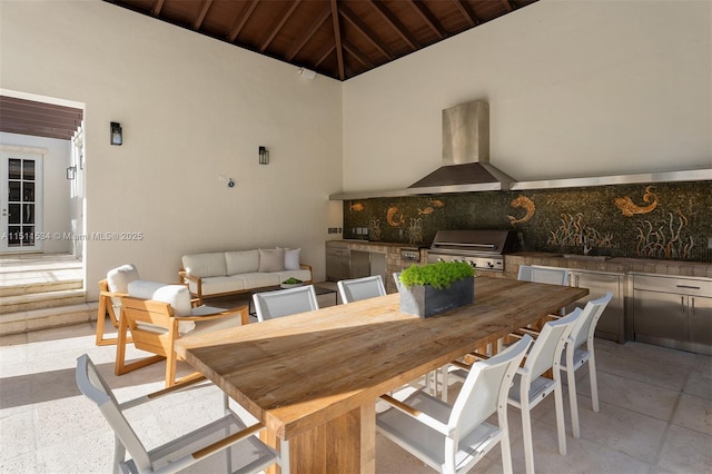 dining room with vaulted ceiling with beams and wood ceiling