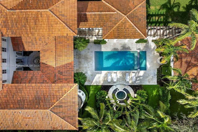 drone / aerial view of a pool area