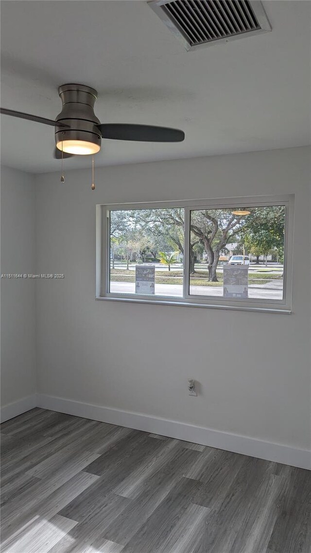 corridor featuring dark hardwood / wood-style floors