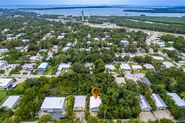 bird's eye view with a residential view and a water view