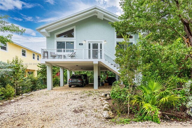 view of front of house featuring a carport