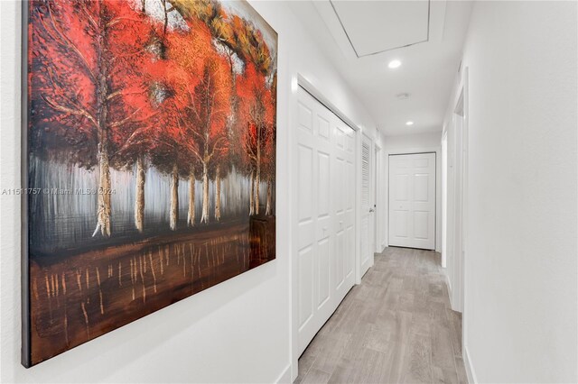 corridor featuring light hardwood / wood-style flooring