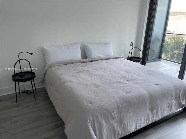 bedroom featuring hardwood / wood-style flooring