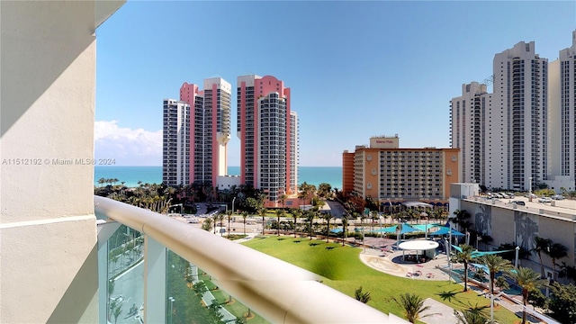 balcony featuring a water view