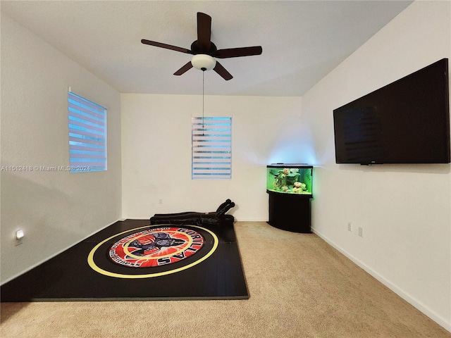 unfurnished bedroom with carpet flooring and ceiling fan