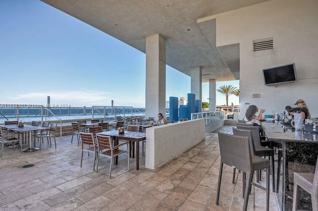 view of patio / terrace with a water view