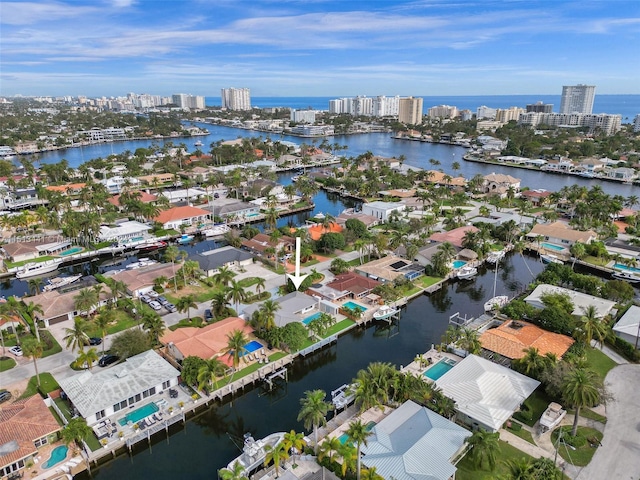 drone / aerial view with a water view