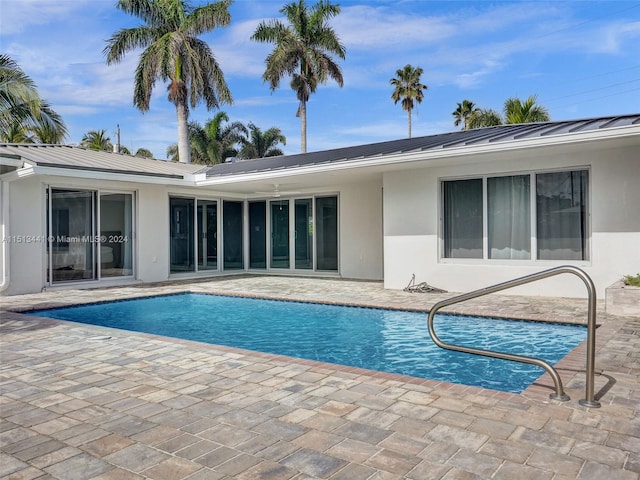 view of swimming pool featuring a patio