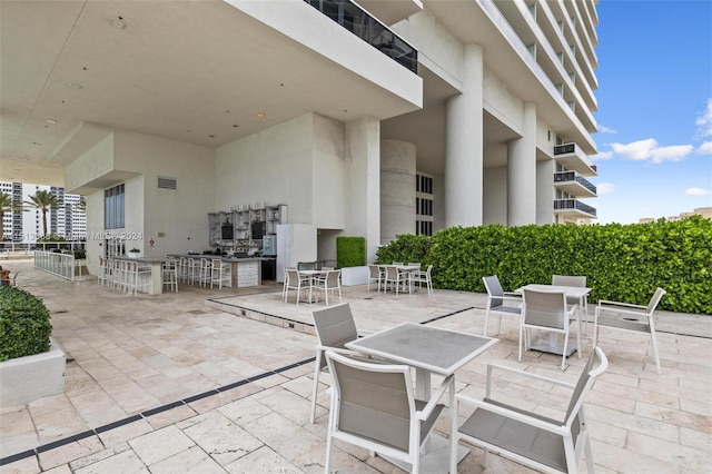 view of patio / terrace with a balcony