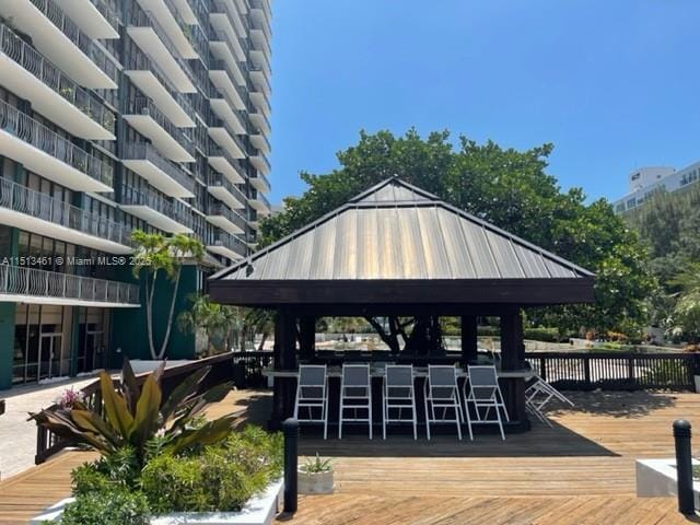 view of home's community featuring a gazebo and an outdoor bar