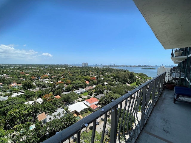 balcony featuring a water view