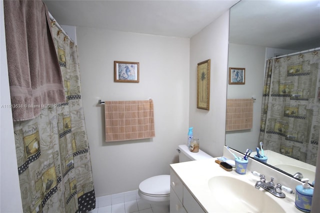 bathroom featuring vanity, tile patterned flooring, toilet, and a shower with shower curtain