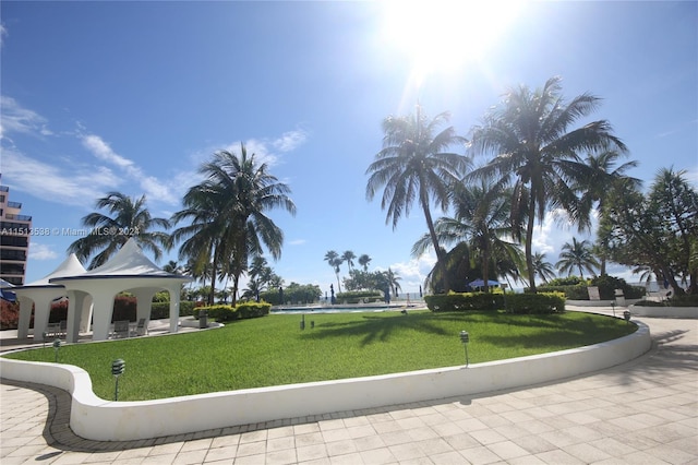 view of community with a gazebo and a yard