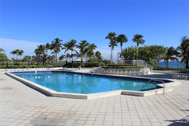 view of swimming pool with a patio area