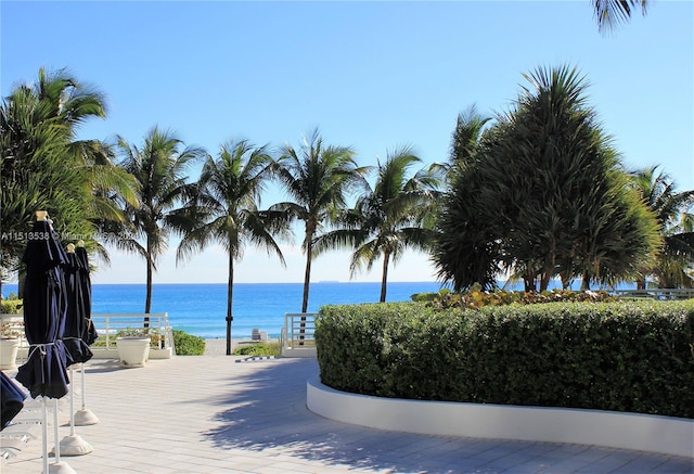 surrounding community featuring a water view