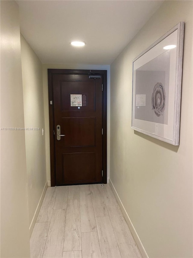 hallway featuring light hardwood / wood-style flooring