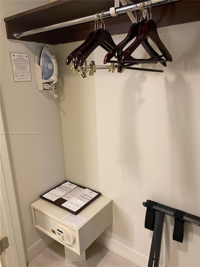 spacious closet with light hardwood / wood-style floors