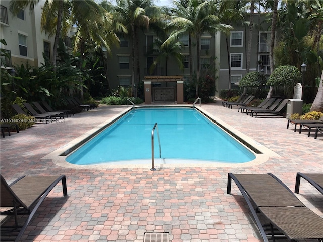 view of pool featuring a patio area