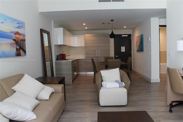 living room with light hardwood / wood-style floors