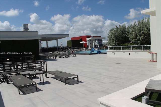 view of patio with a community pool