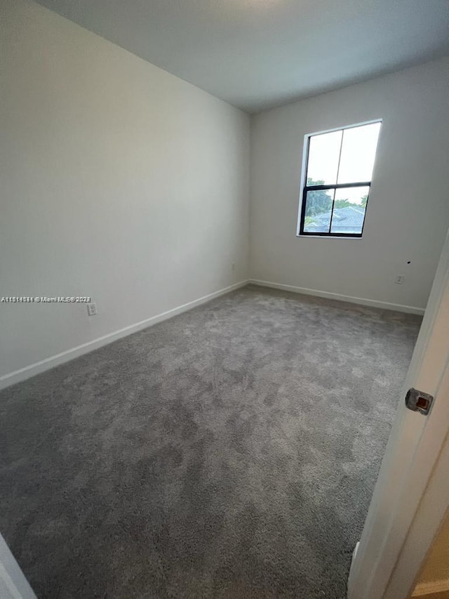 spare room with carpet flooring