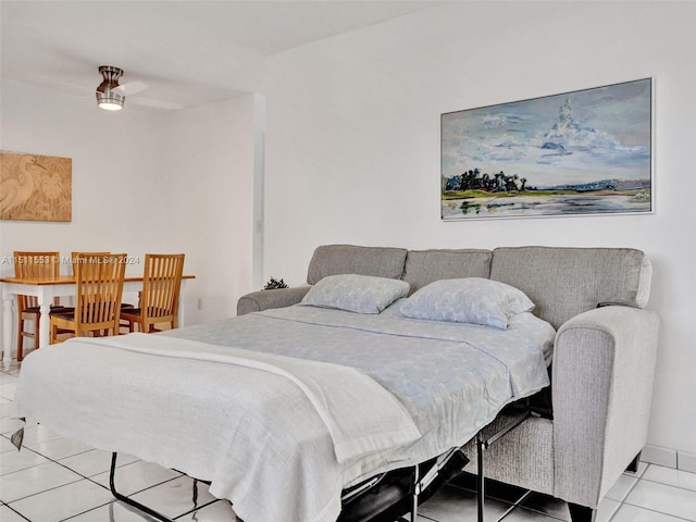 bedroom featuring ceiling fan and tile patterned flooring