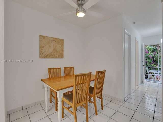 dining room featuring ceiling fan and light tile patterned floors