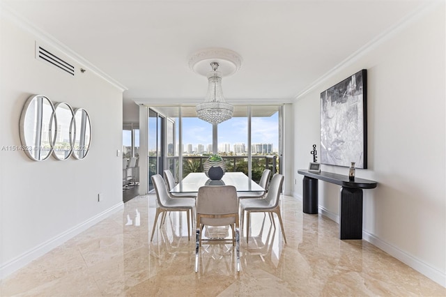 tiled dining space featuring crown molding, a chandelier, and expansive windows