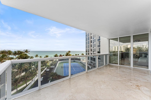 balcony featuring a water view