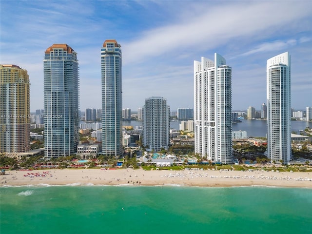 city view featuring a water view and a beach view