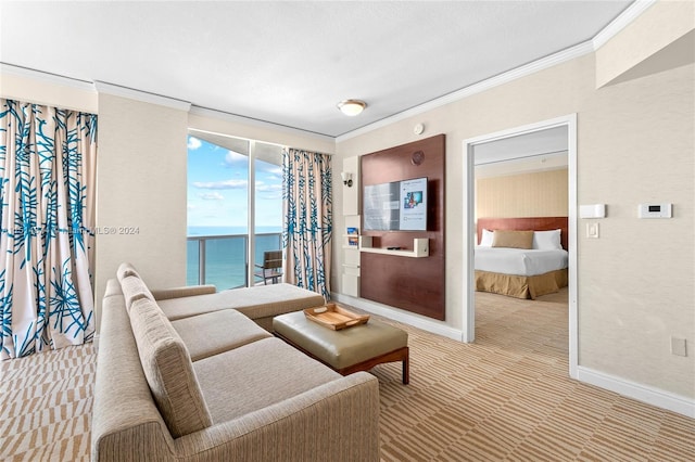 living room with a water view, light colored carpet, and crown molding