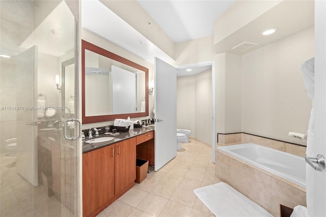 full bathroom with tile patterned flooring, separate shower and tub, a bidet, toilet, and vanity