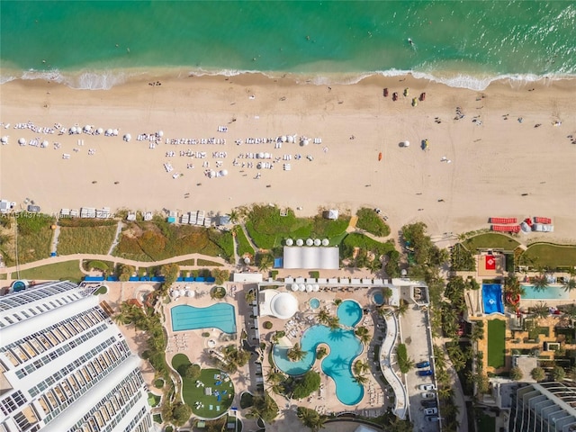 bird's eye view with a view of the beach and a water view