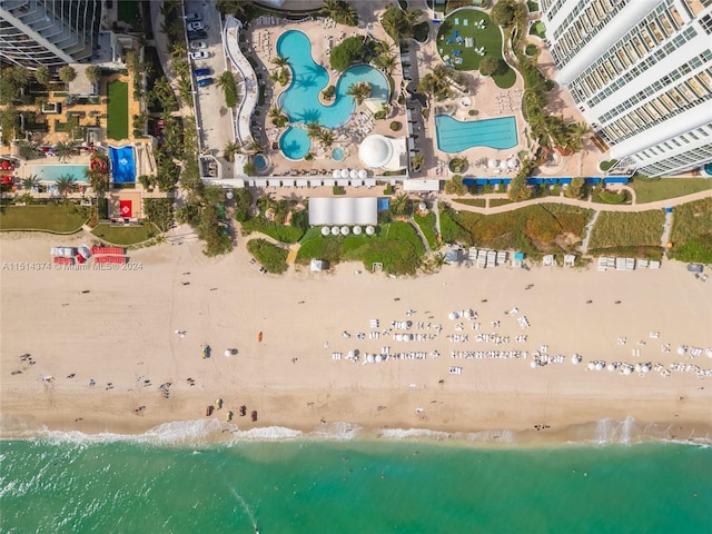 aerial view with a view of the beach and a water view