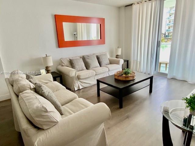 living room with hardwood / wood-style floors