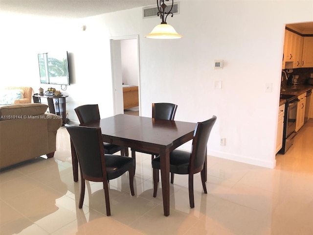 tiled dining space with sink