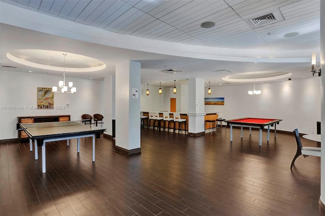 game room featuring an inviting chandelier, pool table, a tray ceiling, and wooden ceiling