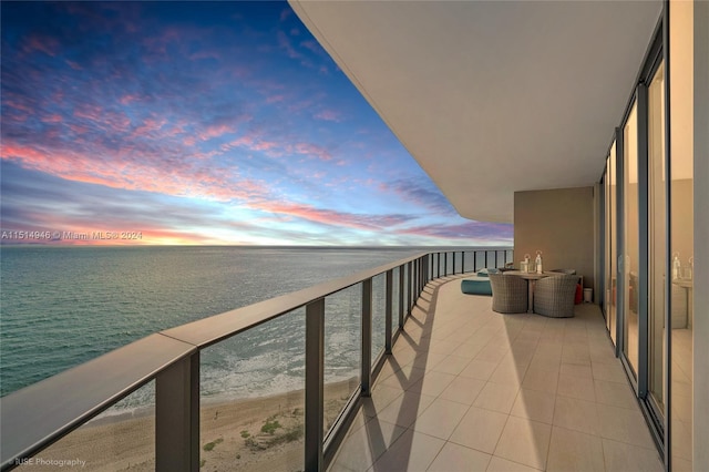 balcony at dusk with a water view