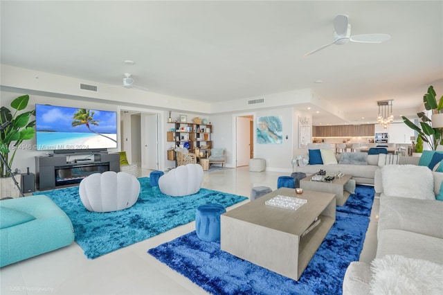 living room featuring tile flooring and ceiling fan