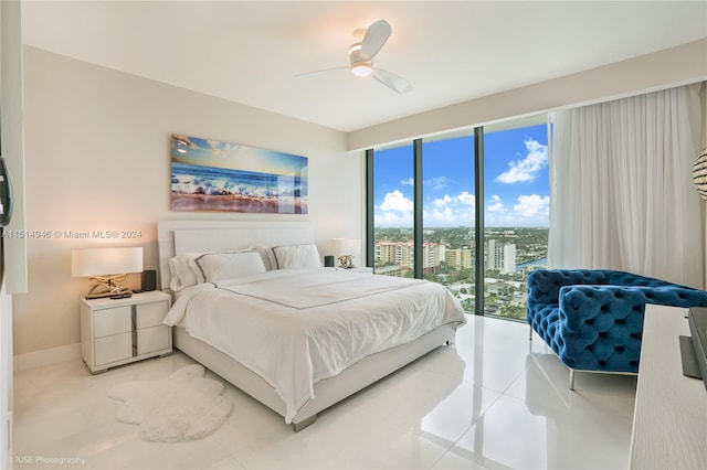 tiled bedroom featuring access to exterior and ceiling fan