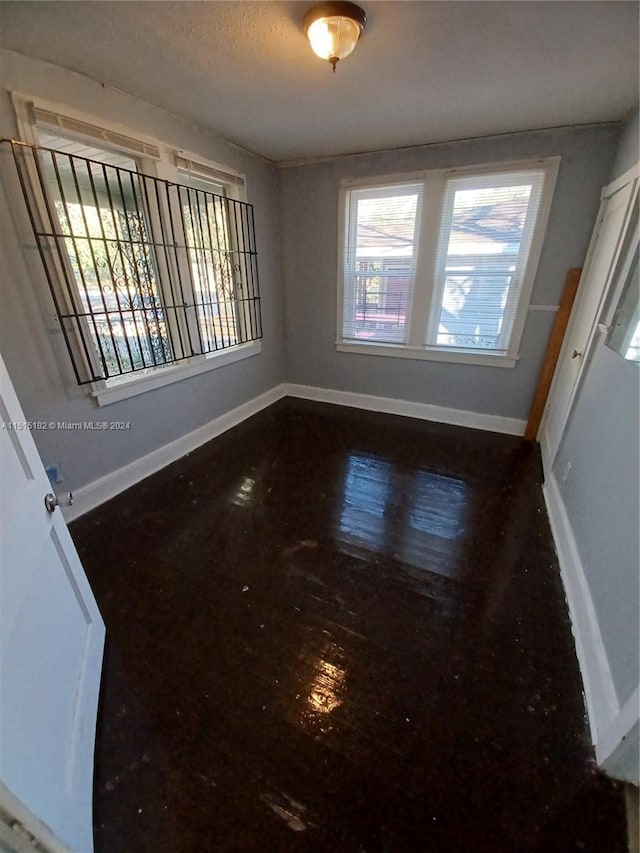 empty room featuring hardwood / wood-style floors