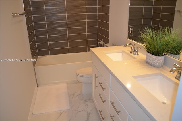 full bathroom with tile floors, tiled shower / bath, toilet, and dual bowl vanity