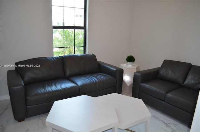 living room featuring light tile floors