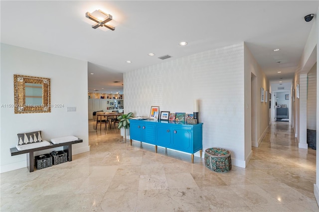 living room with light tile patterned floors, french doors, and built in features